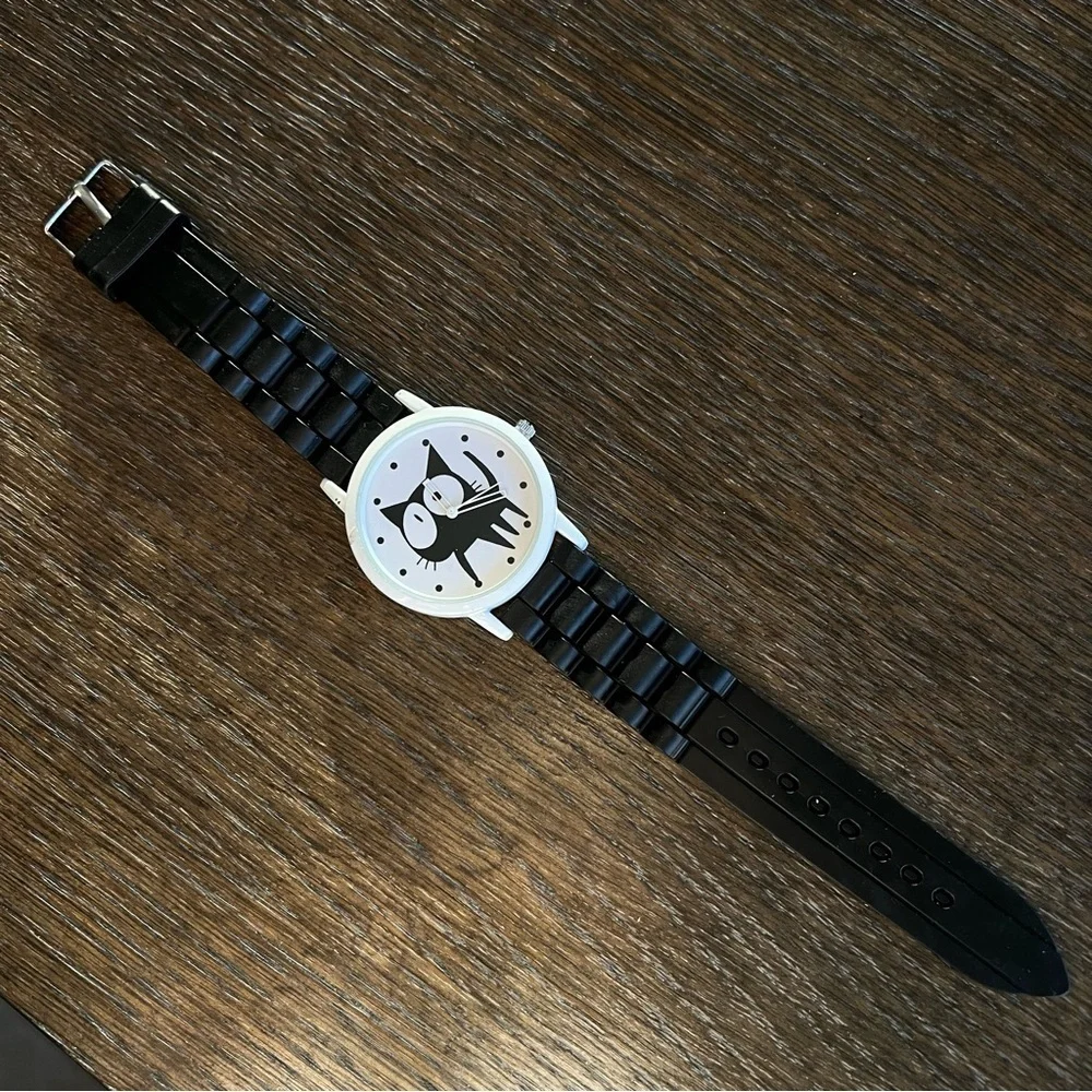 Cat watch, rubber black watch band. Gently used